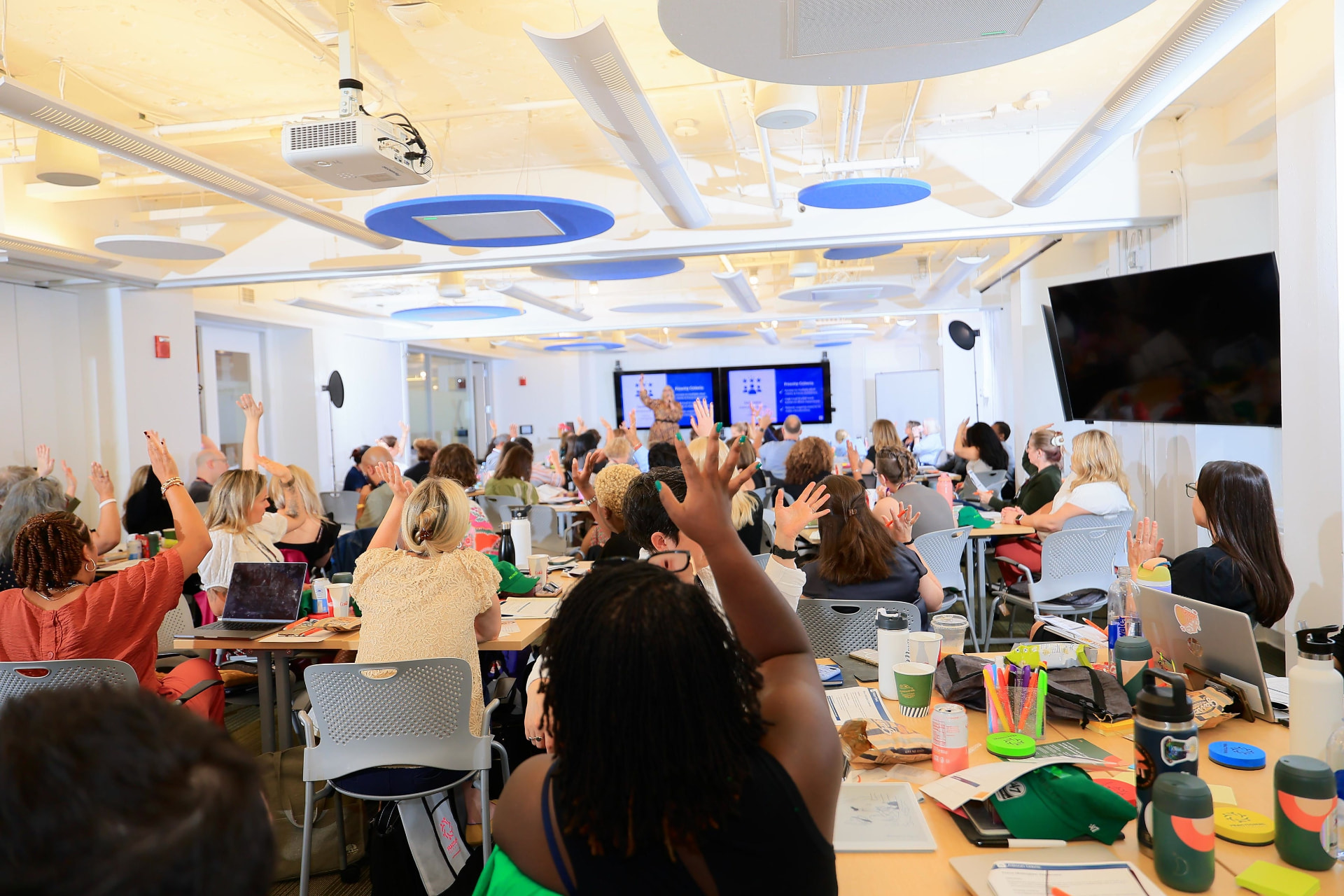 FPP members raising their hands during a live session